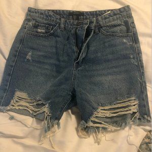 Ripped up Jean shorts (longer)